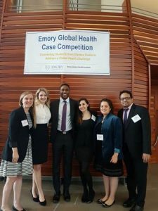 Student team pictured under banner at Emory University