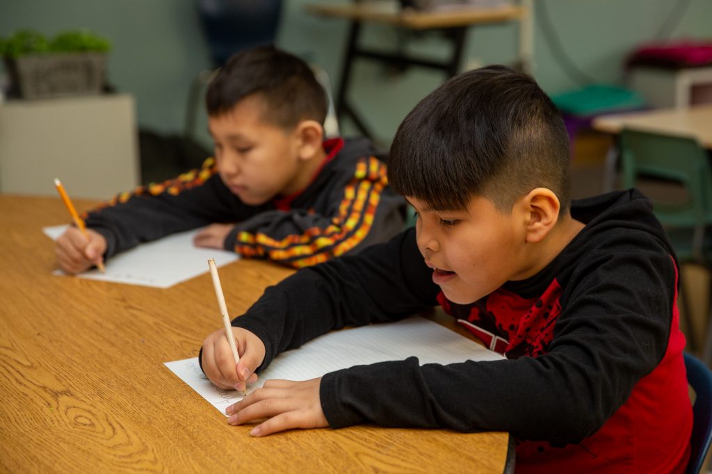 Students from Ermineskin Elementary School, a Cree Community School in Maskwacîs, Alberta, who participated in the Model Schools Literacy Project. Professor Julia O’Sullivan is the chief advisor of the project, which aims to enhance the reading and writing skills of First Nations children in Canada.