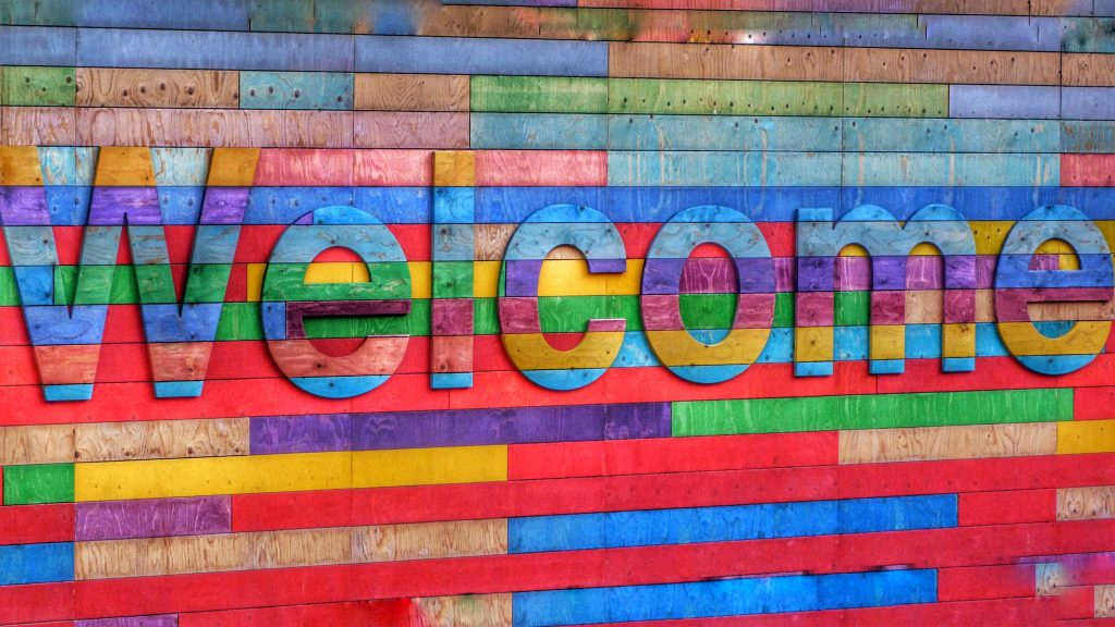 colourful tiles spelling welcome