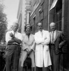 From left to right, Dr. Donald T. Fraser and Dr. Frieda H. Fraser, with R.C. Parker and R.D. Defries at the School of Hygiene, c. 1940s.