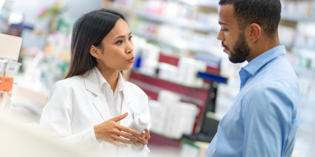 Image of a pharmacist helping a patient